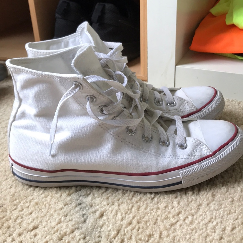 Chuck Taylor’s white hightop converse